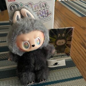 Cute Gray and Black Furry Toy